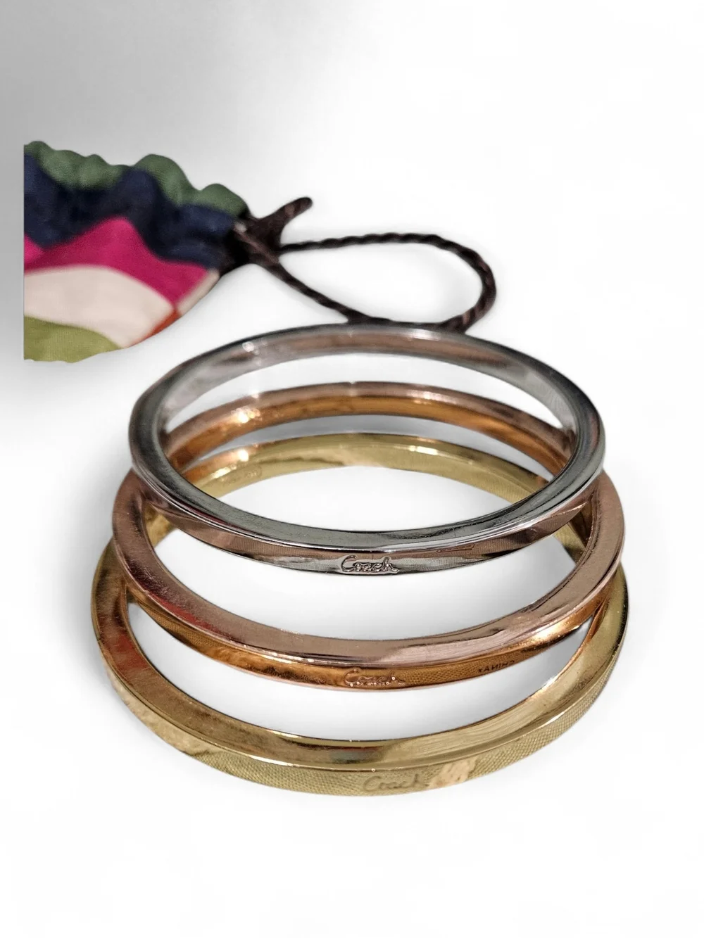 Coach Tri-Tone Metal Stackable Bangle Bracelet Set - Gold, Rose Gold, Silver - Picture 3 of 5